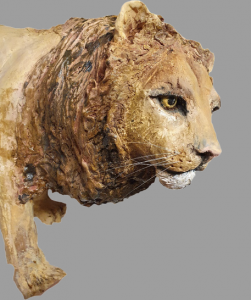 ceramic lion animal sculpture, lion walking on the prowl