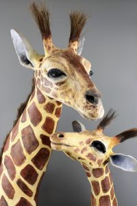 mother and baby giraffe made in stoneware clay