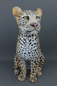 Sitting leopard sculpture in stoneware clay