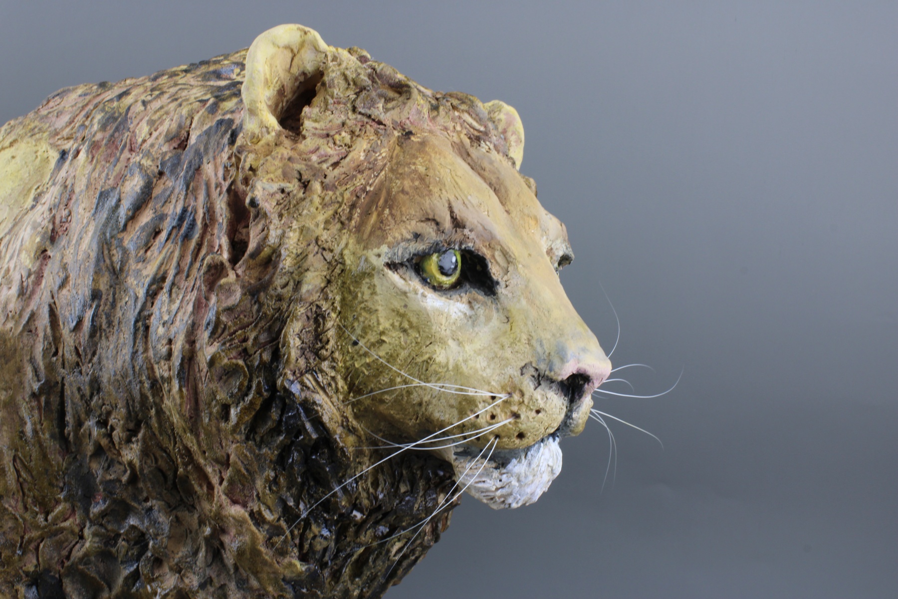 ceramic lion animal sculpture, lion walking on the prowl